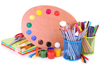 Composition of various creative tools isolated on white