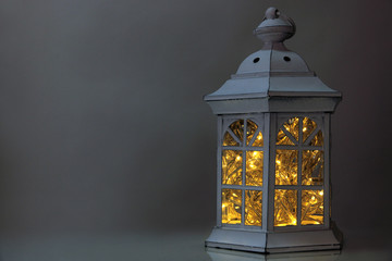 Decorative glowing lantern at night