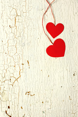 Two red hearts made ​​of paper
