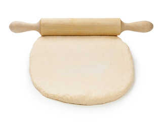 Dough and rolling pin isolated on white background. Space for yo