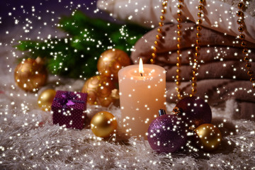 Composition with plaids, candles and Christmas decorations,