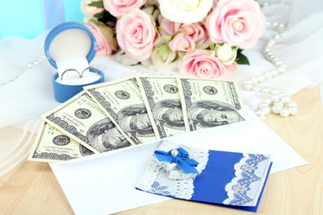 Obraz na płótnie Canvas Dollar bills in envelope as gift at wedding