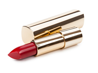 Beautiful bright lipstick in a gold box isolated on white backgr