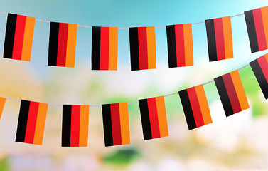 Garland of flags on bright background