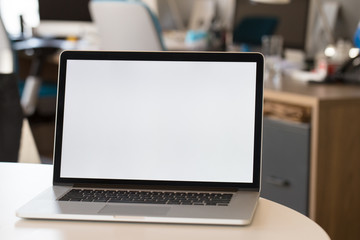 Laptop pc on the table in office.