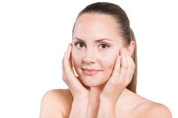 Beauty portrait of young woman, hands touched to cheeks,