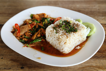Fried pork with sweet basi and white jasmine sticky rice