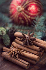 Obraz na płótnie Canvas Christmas herbs: cinnamon sticks and star anise, close-up