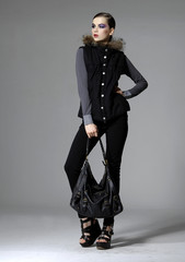 full length fashion model in black jacket