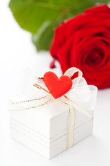 Valentine's gift decorated with heart and red rose