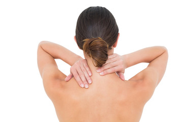 Obraz premium Rear view of a topless woman suffering from neck ache