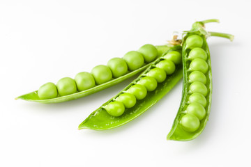 Fresh peas isolated on white background