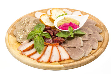 plate of sausages and bacon sauce