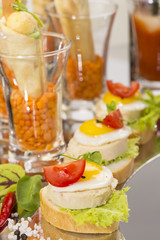 canape with meat vegetables and seafood