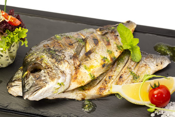 sea fish cooked on the grill