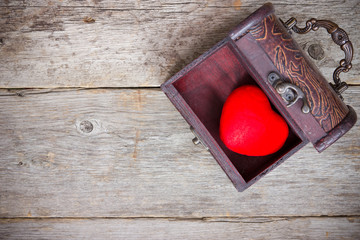 Red heart  in the old  box