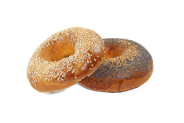 Two bagels with sesame and poppy seeds