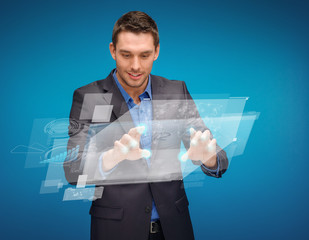 businessman working with imaginary virtual screen