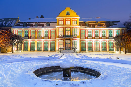 Winter scenery of Abbots Palace in snowy park of Gdansk, Poland