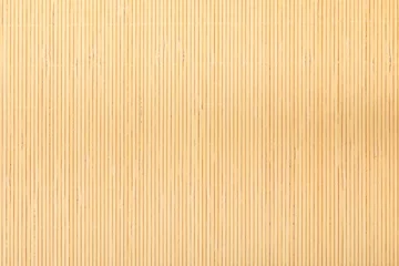Fototapete Rund Close up beige bamboo mat striped background texture pattern © Voyagerix