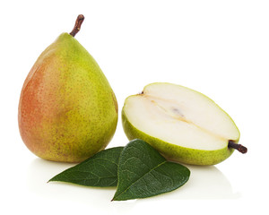 Ripe pear with cut and green leaves isolated on white background
