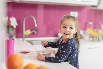 Little girl in the kitchen