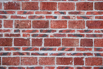 red brick wall, square format