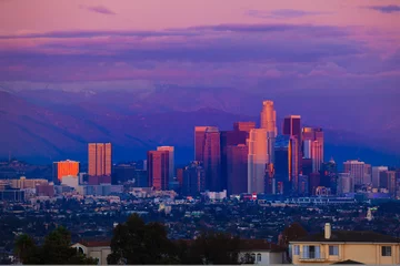 Foto op Canvas De stadshorizon van Los Angeles bij zonsondergang © logoboom