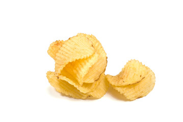 Heap of Ribbed Potato Chips isolated on white