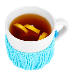 Cup of tea with lemon isolated on white
