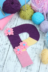 One letter of knit handmade alphabet close up