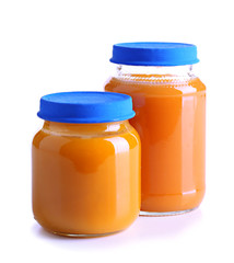 Baby food in glass jars, isolated on white
