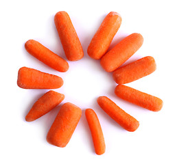 Baby carrot sticks isolated on white