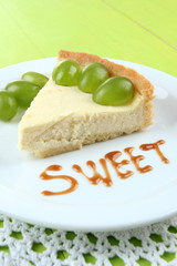 Slice of cheesecake with grape berries