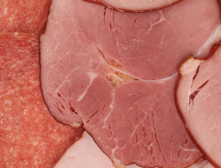Close up of sausage and ham.