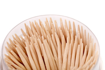 Toothpicks in a round box.