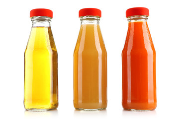 Baby food (juices) in glass jars, isolated on white