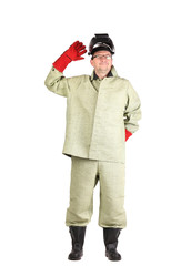 Obraz premium Smiling welder in red gloves.