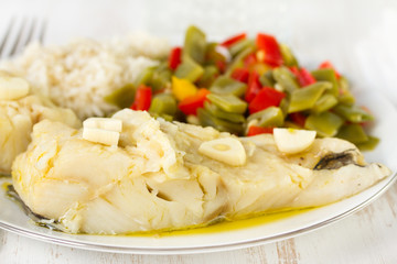 cod fish with vegetables and boiled rice