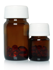 Glass medical bottles on white background .