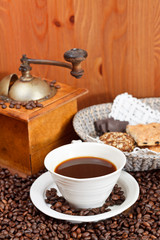 Obraz na płótnie Canvas cup of coffee and roasted beans