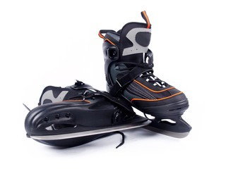 Pair of man ice hockey skates over a white background