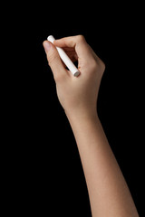 female teen hand with chalk to write something