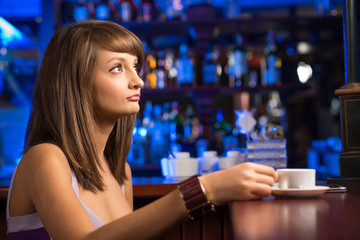 woman with a cup of coffee