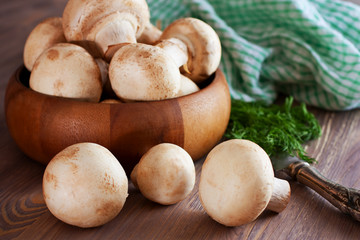Raw mushrooms, garlic, bay leaf and pepper. Prepared for cooking