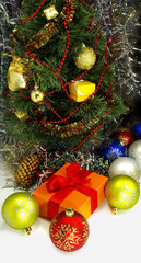 image of a decorated Christmas tree and gift boxes