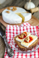 Sliced camembert on the bread
