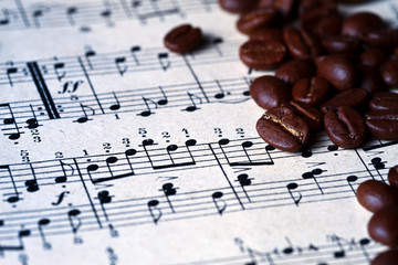 Musical score with coffee beans on it