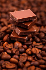 Chocolate bar on coffee beans
