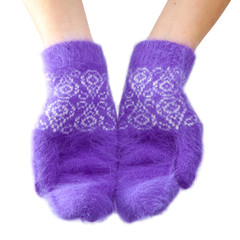 Hands in fluffy lilac mittens